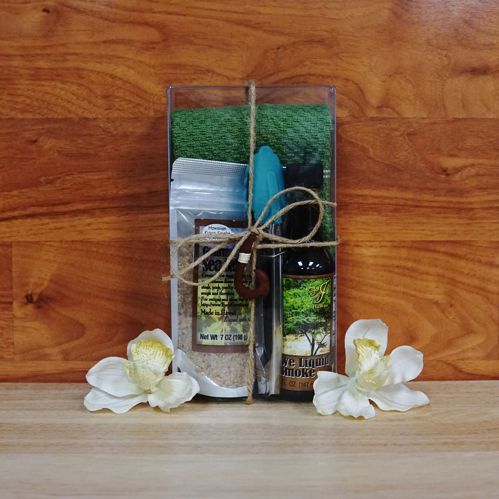 Green Deluxe Kalua Gift Box on a wooden background.