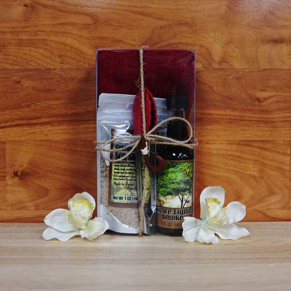 
                  
                    Red Deluxe Kalua Gift Box on a wooden background.
                  
                