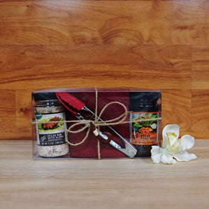 
                  
                    Red Deluxe Steak Poke Gift Box on a wooden background.
                  
                