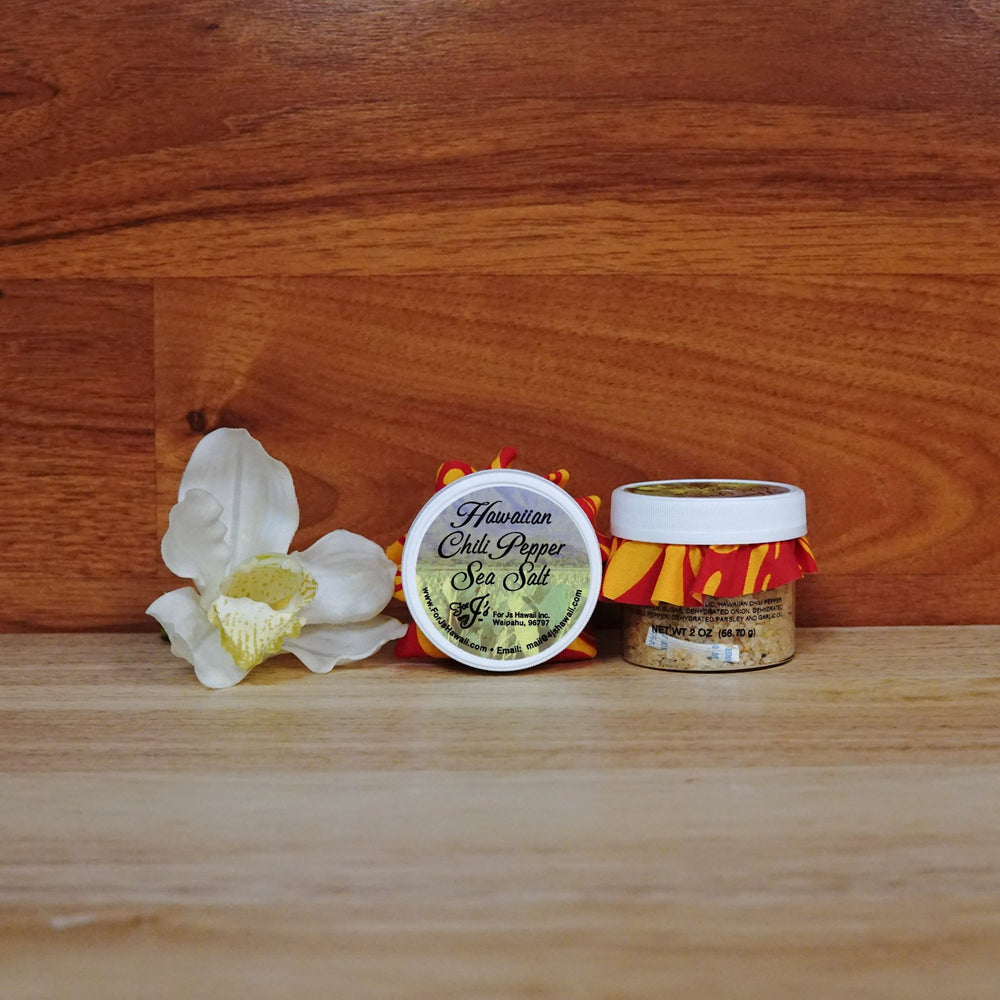 
                  
                    2oz. Hawaiian Chili Pepper Sea Salt on a wooden background.
                  
                